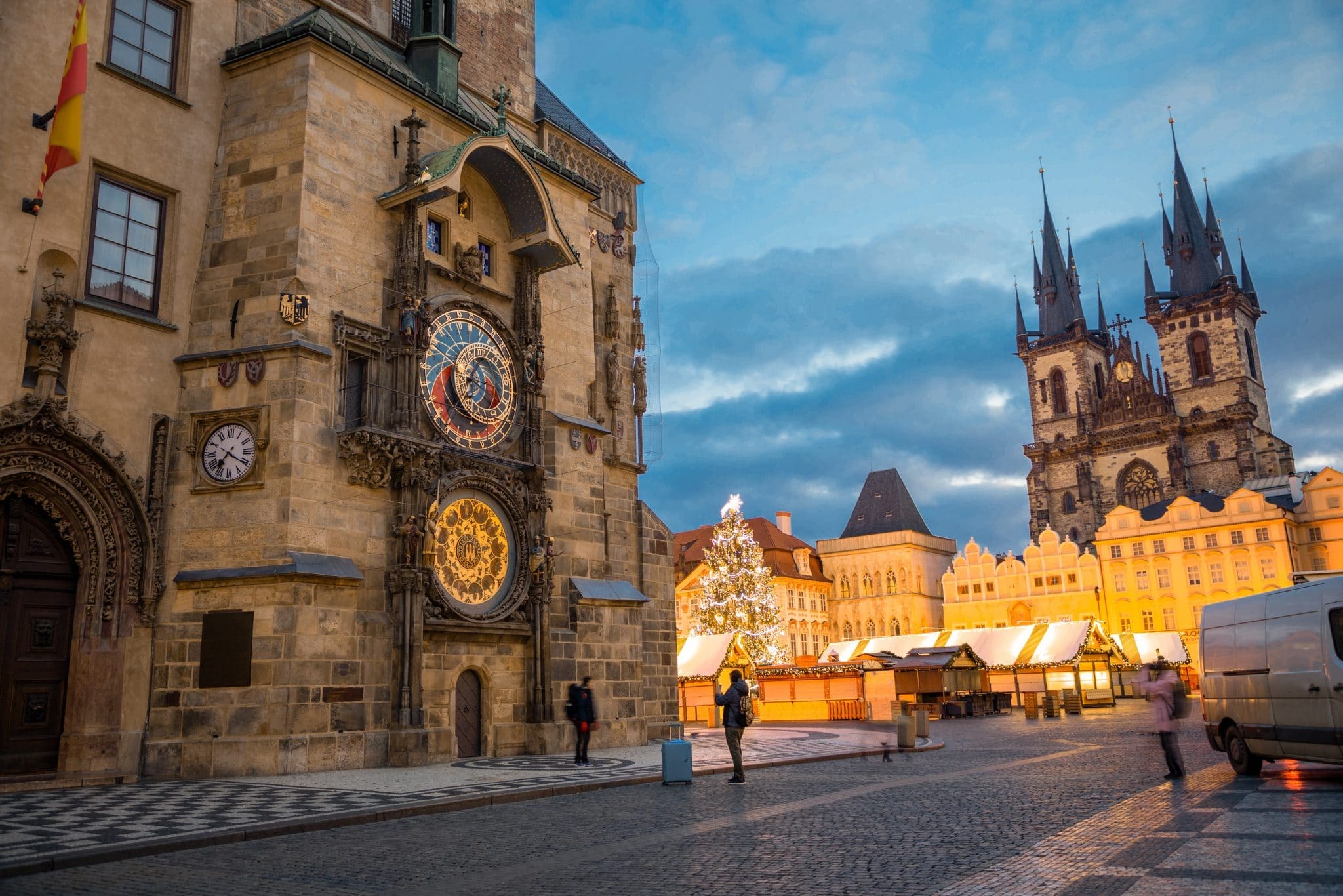 Prague, Czech Republic - 3.12.2019: Christmas market with Christmas tree on the Old Town square in Prague at early morning when all stands are still closed, Czech Republic