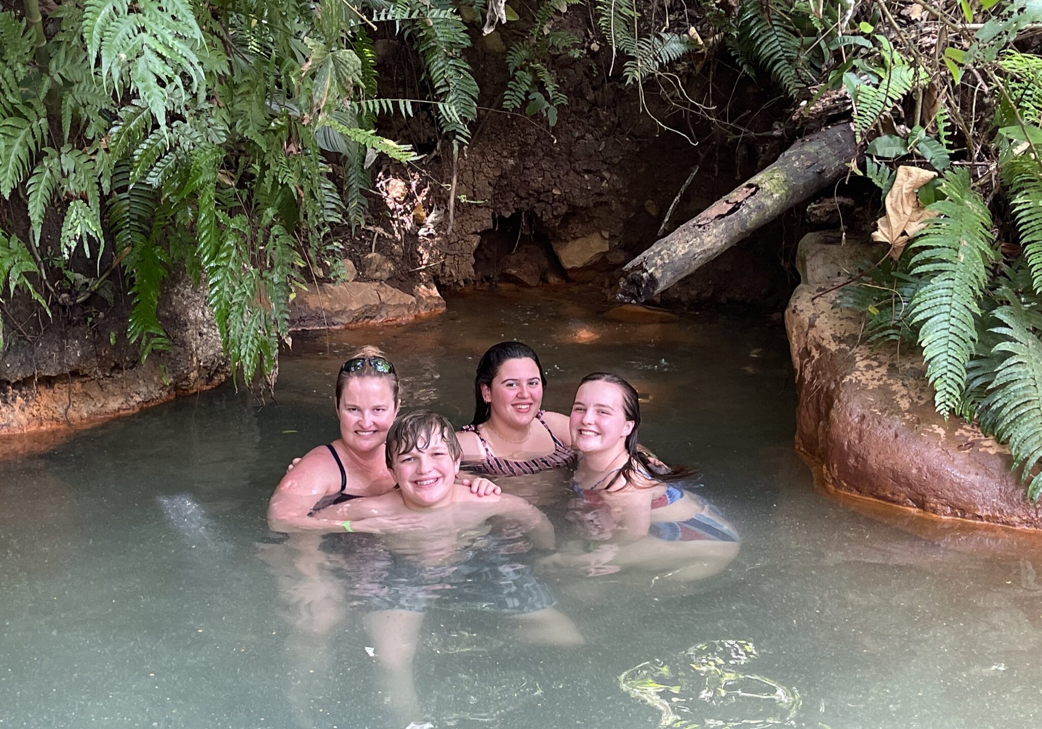 Emily and her kids enjoying the hot springs.